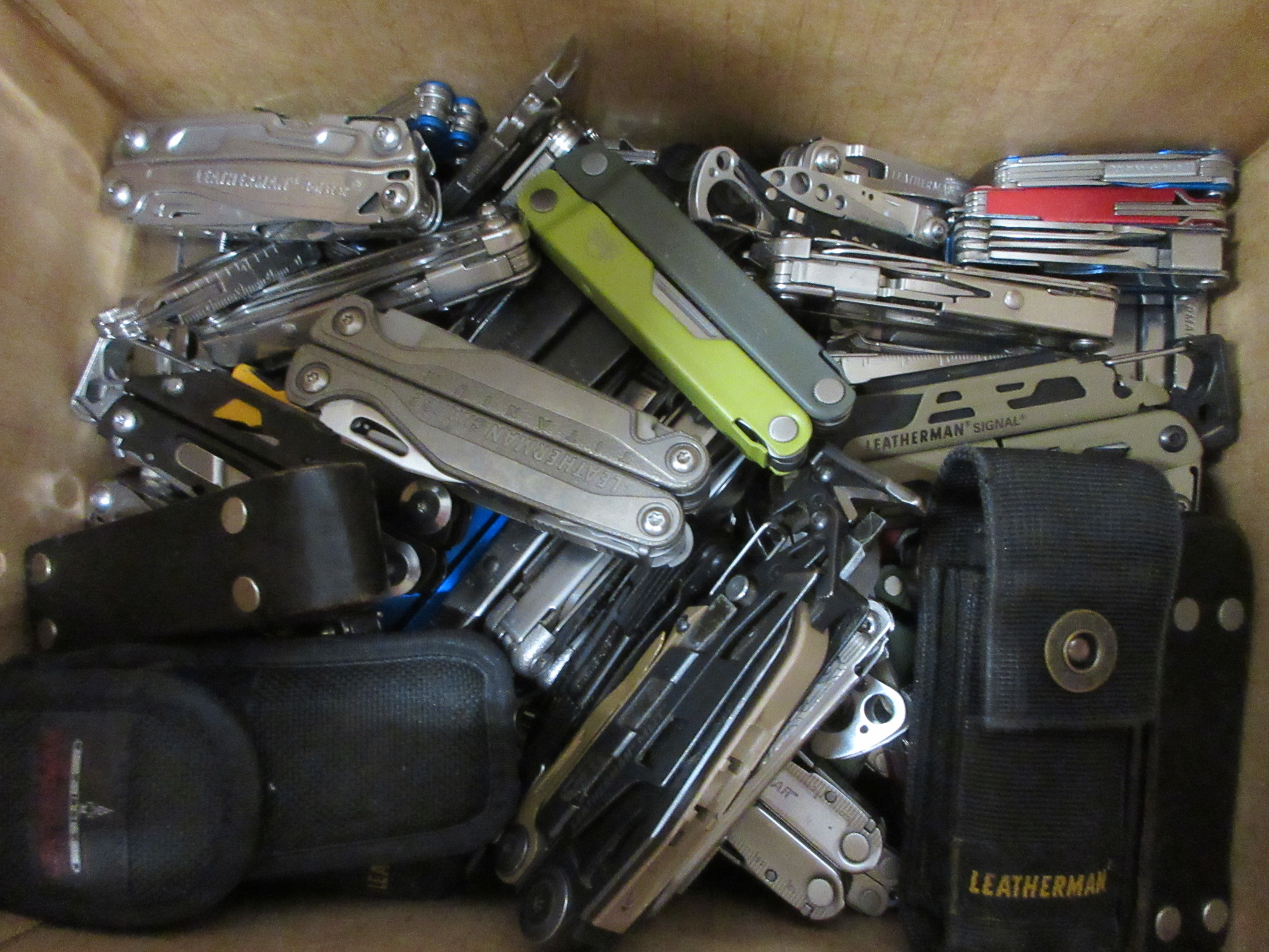 25 POUND BOX OF LEATHERMAN MULTI-TOOLS