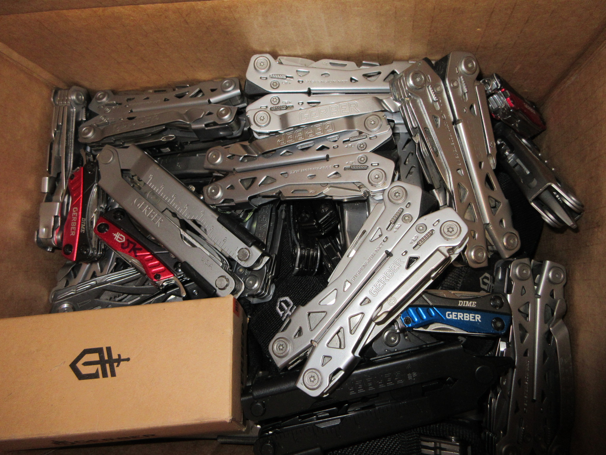 25 POUND BOX OF GERBER MULTI TOOLS
