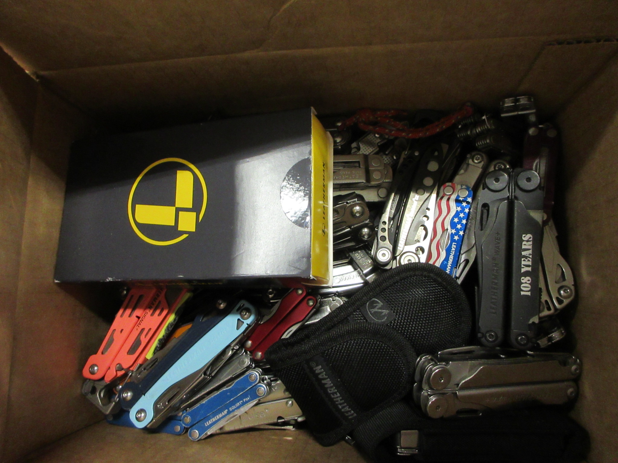 25 POUND BOX OF LEATHERMAN MULTI-TOOLS