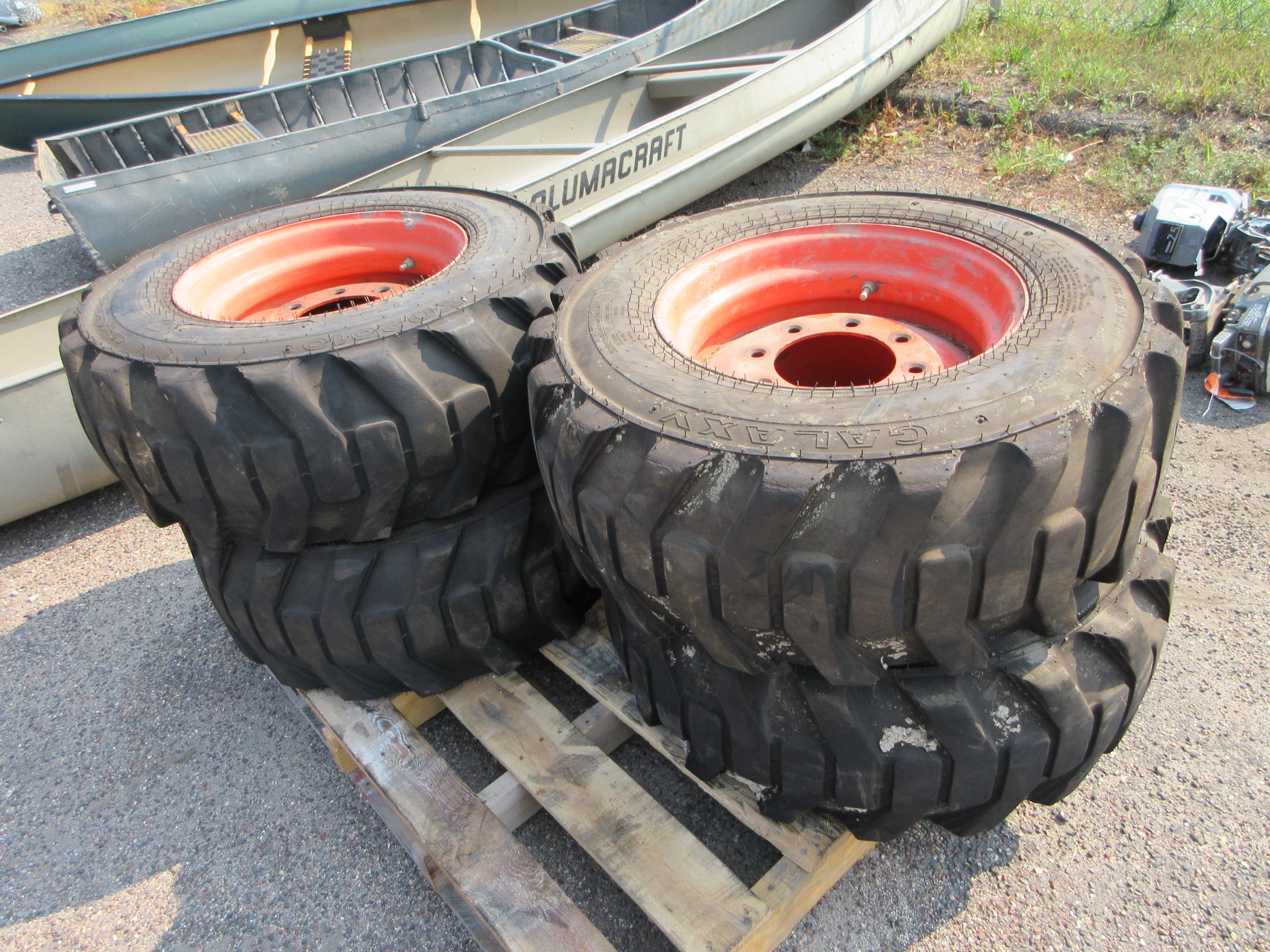 4 BOBCAT TIRES AND RIMS