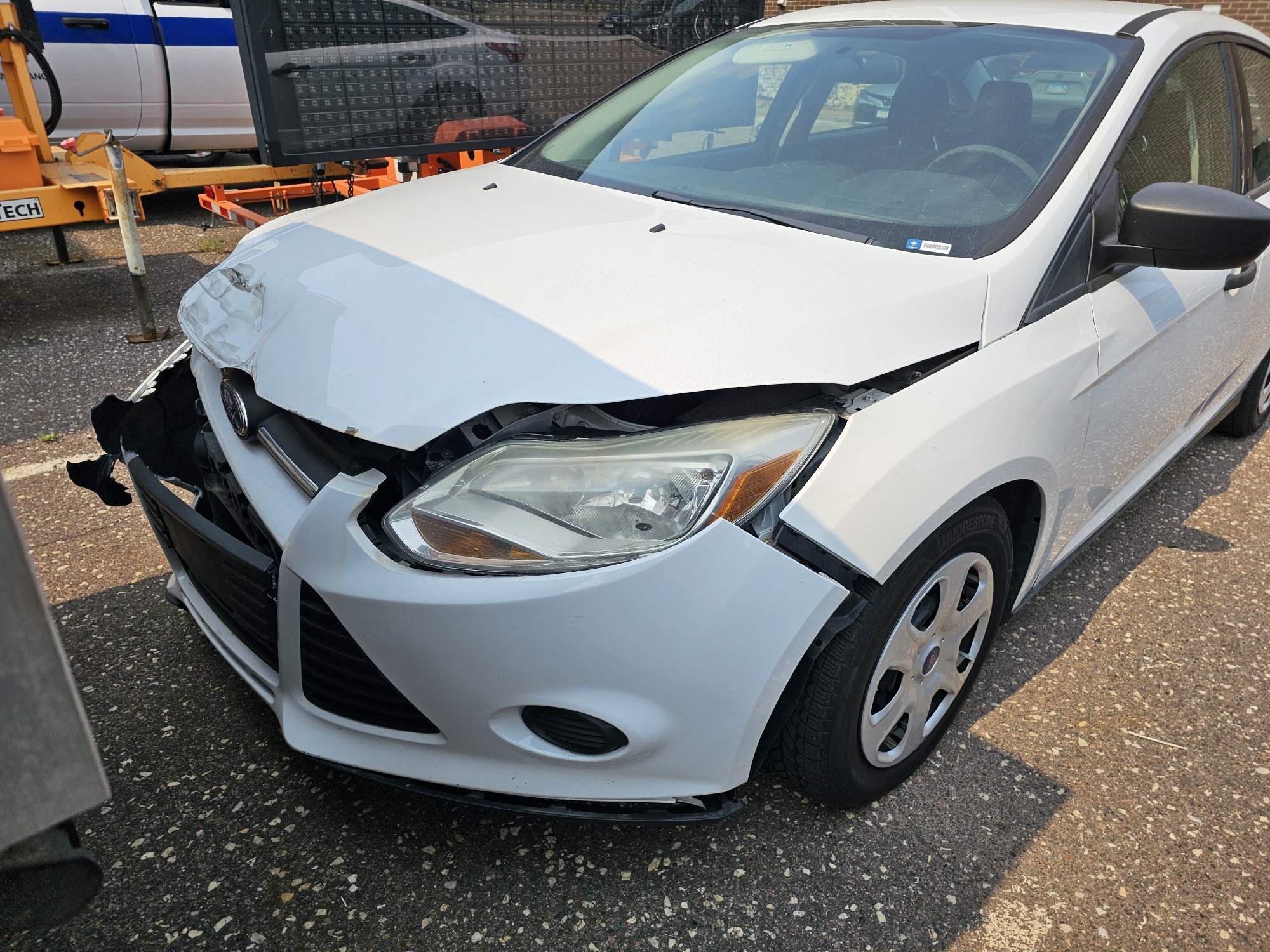 2014 FORD FOCUS S SEDAN, FRONT END DAMAGES.